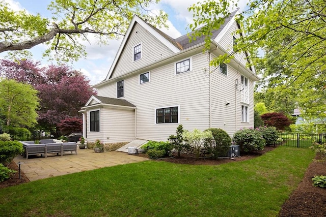 26 Sterling St, Newton, MA 02465 - rear view of property featuring a patio and central air condition unit
