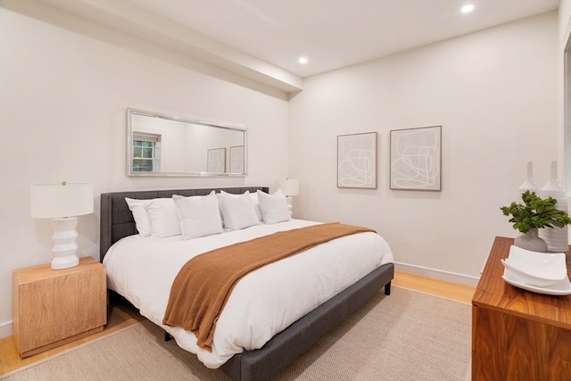 bedroom featuring hardwood / wood-style flooring