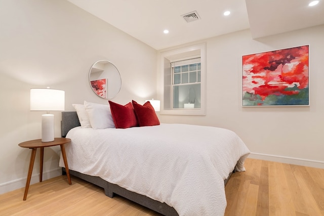 bedroom featuring wood-type flooring