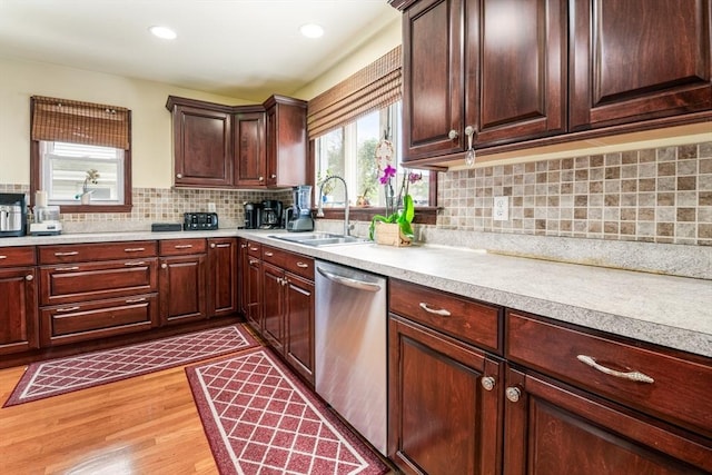 159 White St Unit 159, Belmont, MA 02478 - kitchen with stainless steel dishwasher, a sink, light countertops, light wood finished floors, and recessed lighting