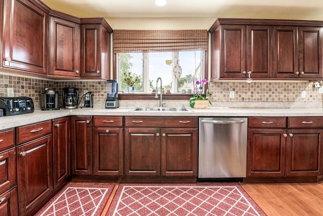 159 White St Unit 159, Belmont, MA 02478 - kitchen featuring stainless steel dishwasher, a sink, and light countertops