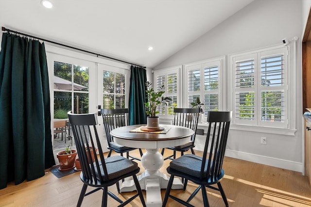 173 Liberty St, Braintree, MA 02184 - dining room with lofted ceiling, recessed lighting, french doors, and light wood finished floors