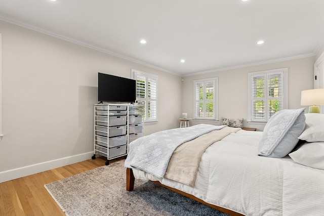 173 Liberty St, Braintree, MA 02184 - bedroom featuring light wood finished floors, multiple windows, ornamental molding, and recessed lighting