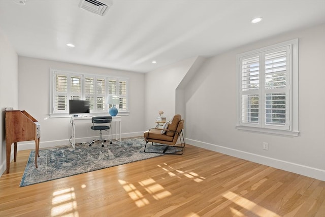 173 Liberty St, Braintree, MA 02184 - home office with wood finished floors, healthy amount of natural light, and recessed lighting