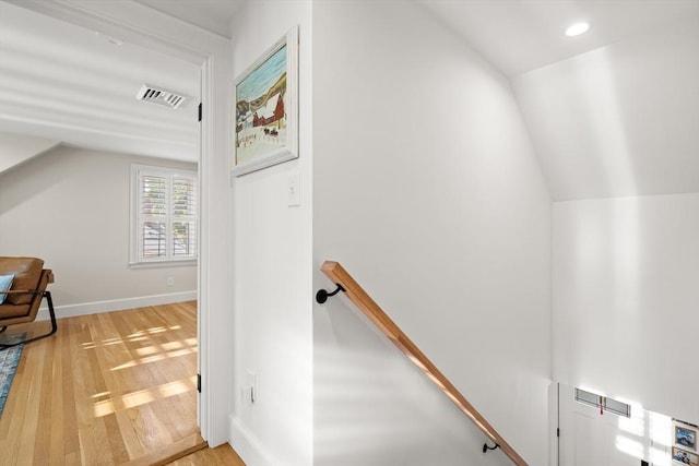 173 Liberty St, Braintree, MA 02184 - stairway featuring vaulted ceiling, wood finished floors, and recessed lighting