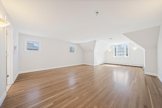 307 York St, Canton, MA 02021 - bonus room with baseboards, plenty of natural light, a baseboard heating unit, and light wood-style flooring