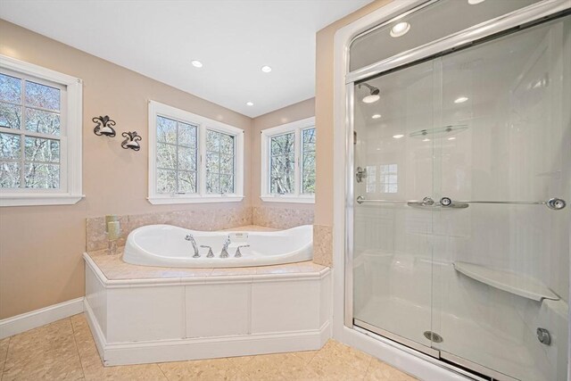 307 York St, Canton, MA 02021 - full bath featuring a garden tub, baseboards, tile patterned flooring, and a shower stall
