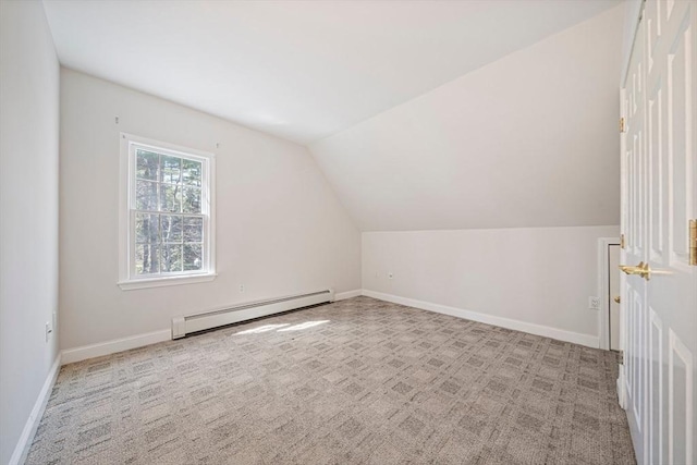 307 York St, Canton, MA 02021 - bonus room with baseboards, baseboard heating, vaulted ceiling, and carpet flooring
