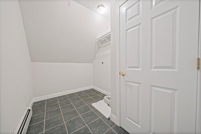 307 York St, Canton, MA 02021 - interior space featuring dark tile patterned flooring, a baseboard radiator, and lofted ceiling