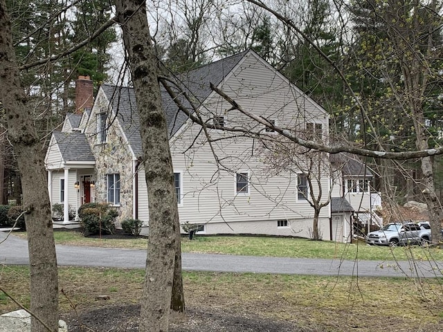 307 York St, Canton, MA 02021 - view of front of home featuring a chimney and a front yard