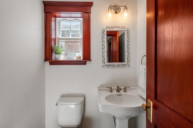 bathroom featuring toilet