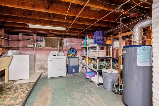 unfinished basement featuring a sink, independent washer and dryer, and water heater