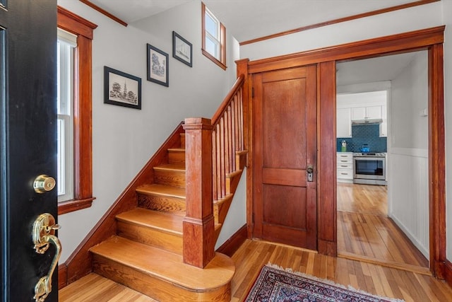 stairway featuring hardwood / wood-style flooring