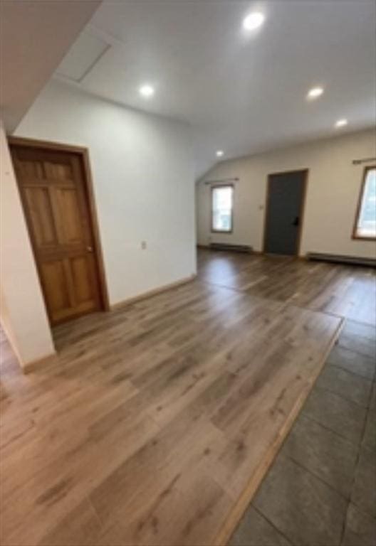 interior space featuring a wealth of natural light, recessed lighting, and wood finished floors