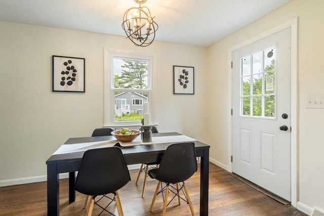 13 Karen Cir, Holliston, MA 01746 - dining area featuring plenty of natural light, a chandelier, baseboards, and dark wood-type flooring