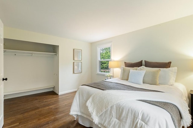 13 Karen Cir, Holliston, MA 01746 - bedroom with wood finished floors, baseboards, and a closet