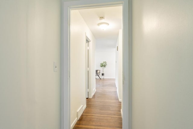 13 Karen Cir, Holliston, MA 01746 - corridor with dark wood-style floors and baseboards