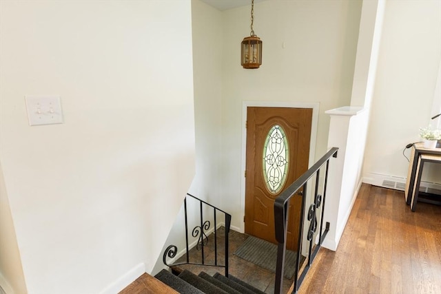 13 Karen Cir, Holliston, MA 01746 - foyer with dark wood finished floors and baseboards