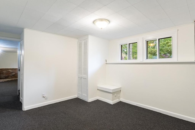 13 Karen Cir, Holliston, MA 01746 - empty room featuring dark carpet and baseboards