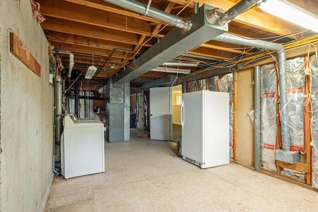 13 Karen Cir, Holliston, MA 01746 - unfinished basement with freestanding refrigerator and washer / clothes dryer