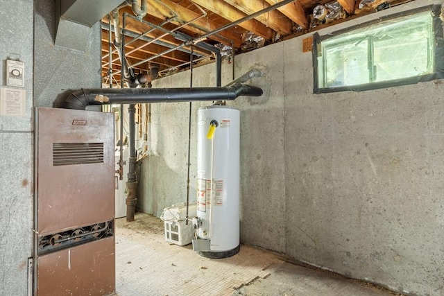 13 Karen Cir, Holliston, MA 01746 - utility room featuring water heater