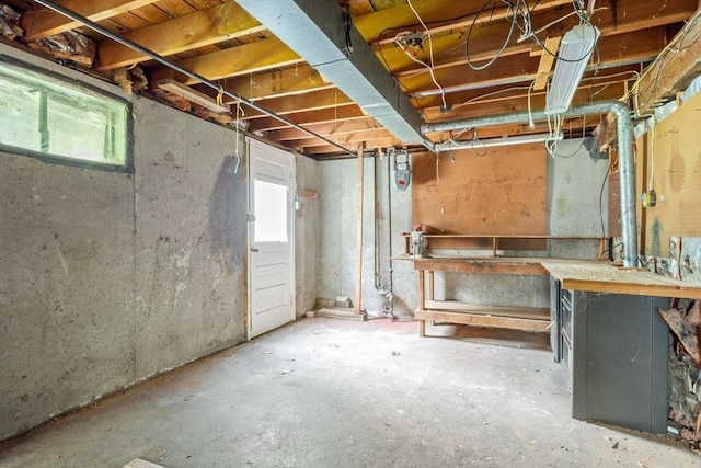 13 Karen Cir, Holliston, MA 01746 - basement with a workshop area