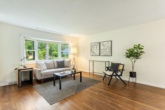 13 Karen Cir, Holliston, MA 01746 - living area featuring wood finished floors and baseboards