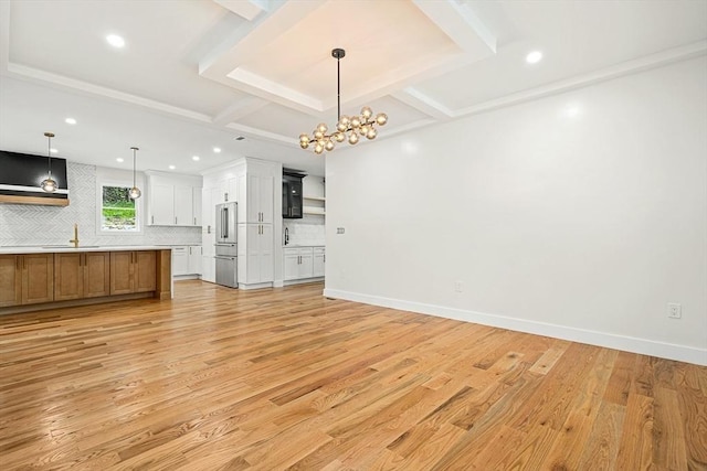 12 Martin St, Carlisle, MA 01741 - unfurnished living room with light wood finished floors, recessed lighting, a chandelier, and beamed ceiling