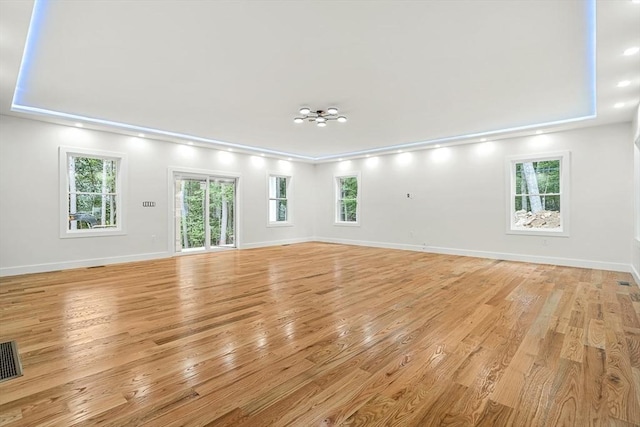 12 Martin St, Carlisle, MA 01741 - spare room featuring light wood-type flooring, healthy amount of natural light, and recessed lighting