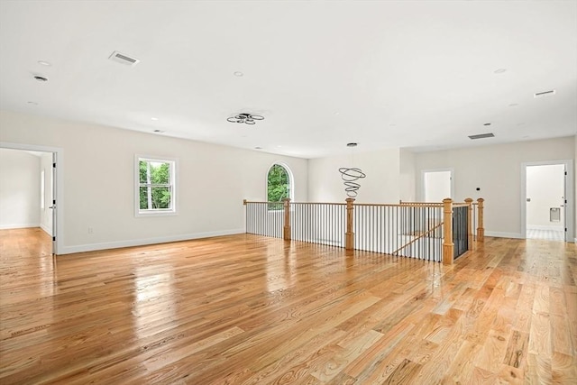 12 Martin St, Carlisle, MA 01741 - empty room featuring light wood-type flooring and baseboards