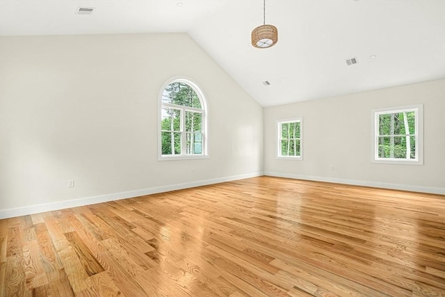 12 Martin St, Carlisle, MA 01741 - spare room with light wood-type flooring and lofted ceiling