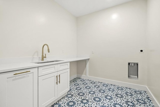 12 Martin St, Carlisle, MA 01741 - laundry room featuring baseboards and electric dryer hookup