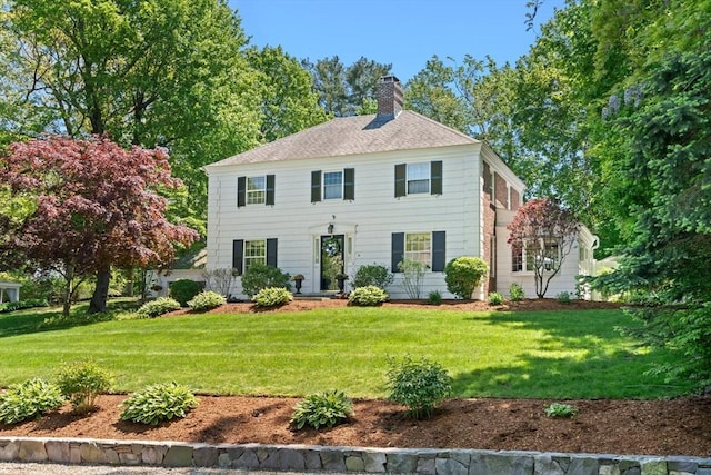 16 Bailey Ln, Dedham, MA 02026 - colonial house with a chimney and a front lawn