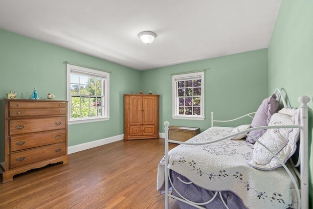 16 Bailey Ln, Dedham, MA 02026 - bedroom with wood finished floors and baseboards
