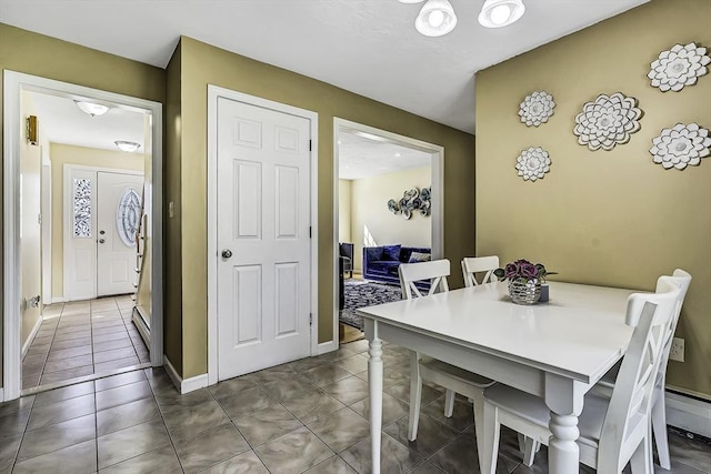 56 Ireta Rd, Shrewsbury, MA 01545 - dining area with tile patterned flooring and baseboards