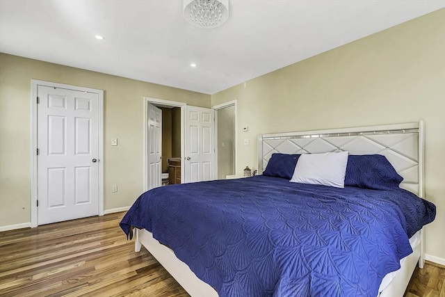 56 Ireta Rd, Shrewsbury, MA 01545 - bedroom with baseboards, wood finished floors, and recessed lighting