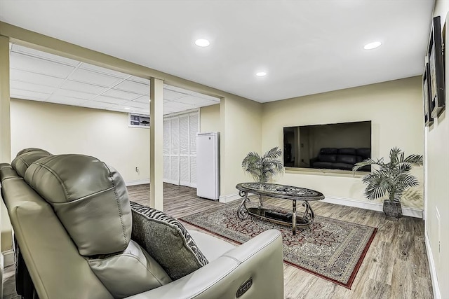 56 Ireta Rd, Shrewsbury, MA 01545 - living room featuring wood finished floors, baseboards, and recessed lighting