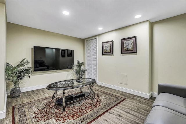 56 Ireta Rd, Shrewsbury, MA 01545 - living area featuring baseboards, wood finished floors, and recessed lighting