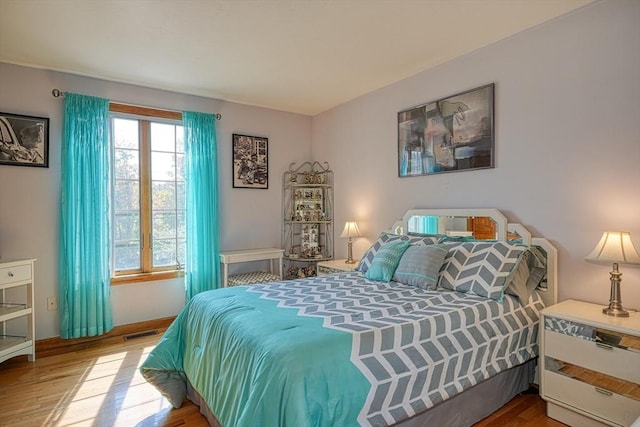 bedroom featuring hardwood / wood-style floors