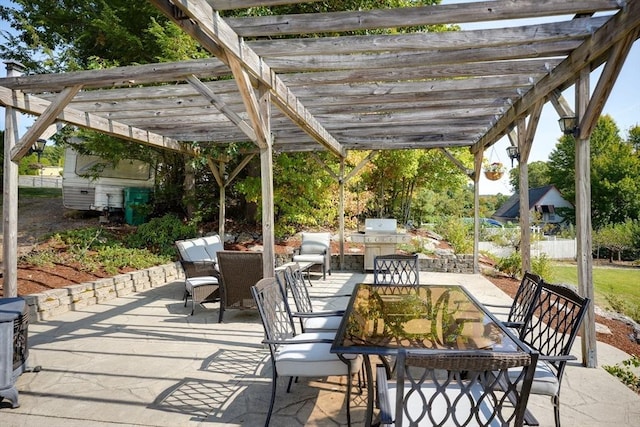 view of patio / terrace with a pergola and grilling area