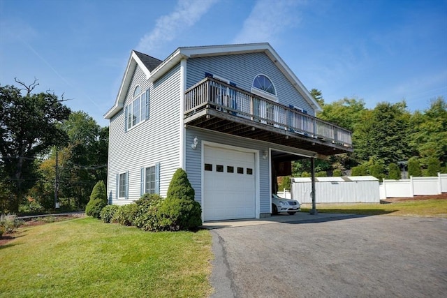 view of front of house featuring a garage and a front yard