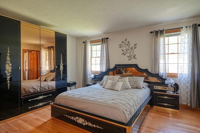 bedroom featuring light hardwood / wood-style floors