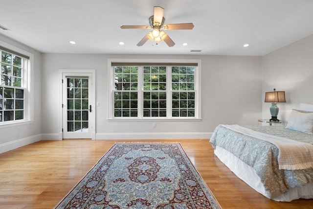 bedroom featuring recessed lighting, visible vents, baseboards, and light wood-style flooring