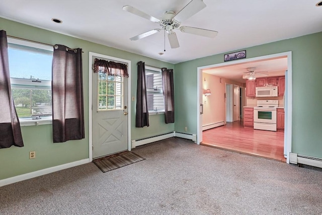 20 Amherst St, Grafton, MA 01536 - entryway with a baseboard heating unit, dark carpet, and a ceiling fan