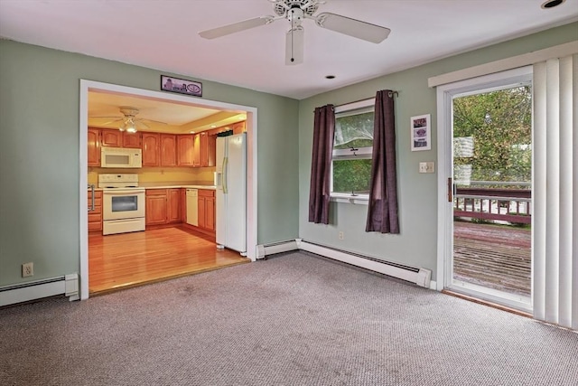 20 Amherst St, Grafton, MA 01536 - unfurnished living room featuring baseboard heating, ceiling fan, and light colored carpet