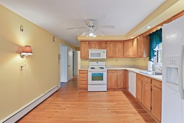 20 Amherst St, Grafton, MA 01536 - kitchen with white appliances, baseboard heating, a sink, ceiling fan, and light wood-type flooring