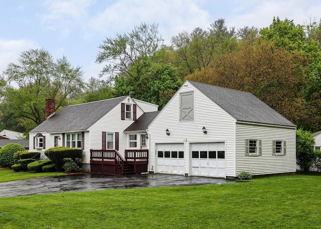 20 Amherst St, Grafton, MA 01536 - cape cod home with a front yard, a shingled roof, a garage, and a wooden deck
