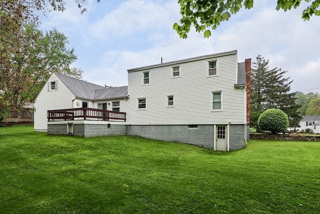 20 Amherst St, Grafton, MA 01536 - rear view of property featuring a lawn, a wooden deck, and a chimney