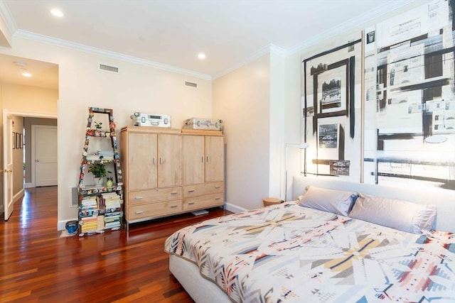 bedroom featuring dark hardwood / wood-style flooring and ornamental molding