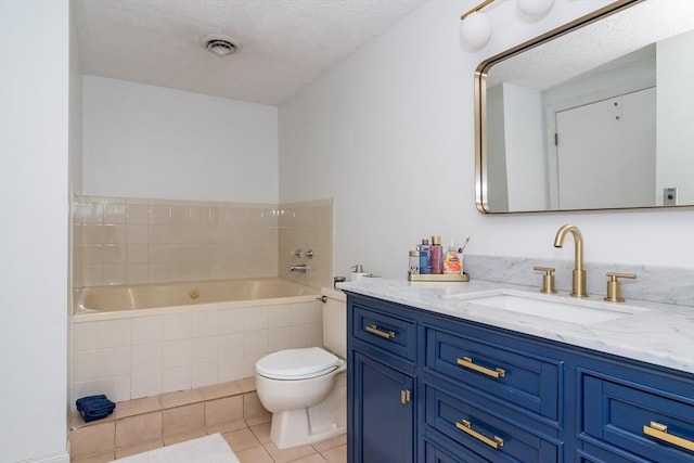 3 Treasure Way Unit 3, Ashland, MA 01721 - bathroom featuring a garden tub, vanity, tile patterned floors, and a textured ceiling